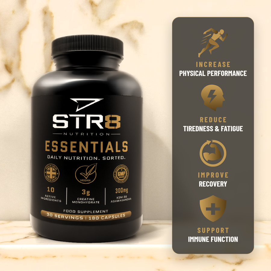 STR8 Nutrition Essentials bottle on marble. Increase physical performance, reduce tiredness and fatigue, support normal muscle function, support immune function.